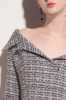Valenciani multicolor tweed mini skirt with a fitted waist and classic hem, stylish and suitable for casual or dressy looks.