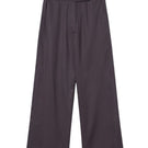 Dāl the Label relaxed wide-leg cropped pants in soft fabric, showcasing a loose fit and cropped length on a mannequin.