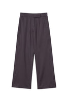 Dāl the Label relaxed wide-leg cropped pants in soft fabric, showcasing a loose fit and cropped length on a mannequin.