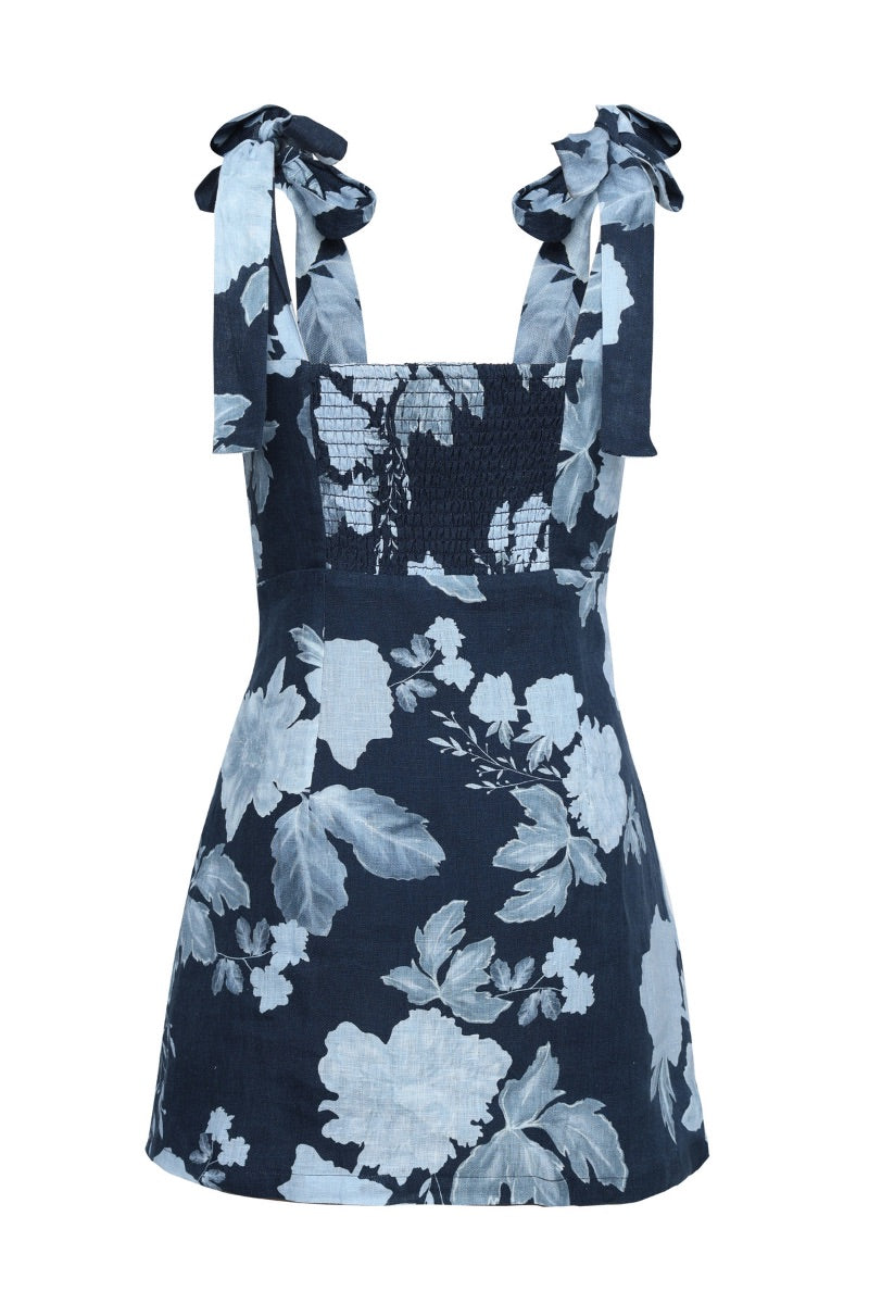 Summer Away midnight blue mini dress, stylish and elegant, shown on a model with a fitted silhouette and sleeveless design.