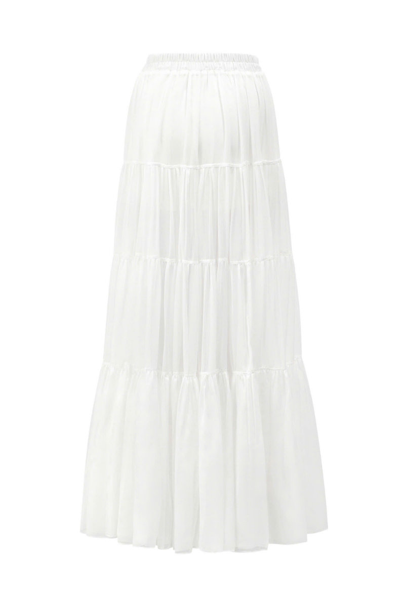 Arti Apparel VIOREIN maxi skirt in flowy fabric, showcasing a full-length design with a high waist and elegant drape.
