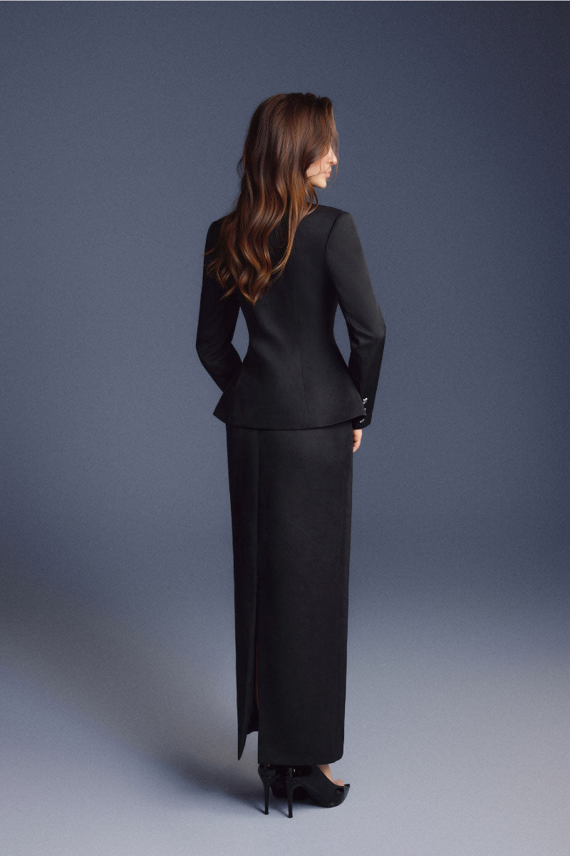 Black zipper peplum top by Keira Tong, featuring a fitted silhouette with a front zipper detail and peplum flare.