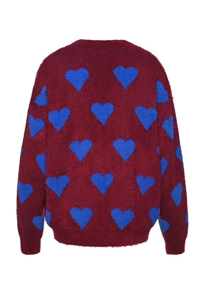 Lalo red multi-heart sweater with a cozy knit design, featuring a vibrant pattern of hearts in various shades.