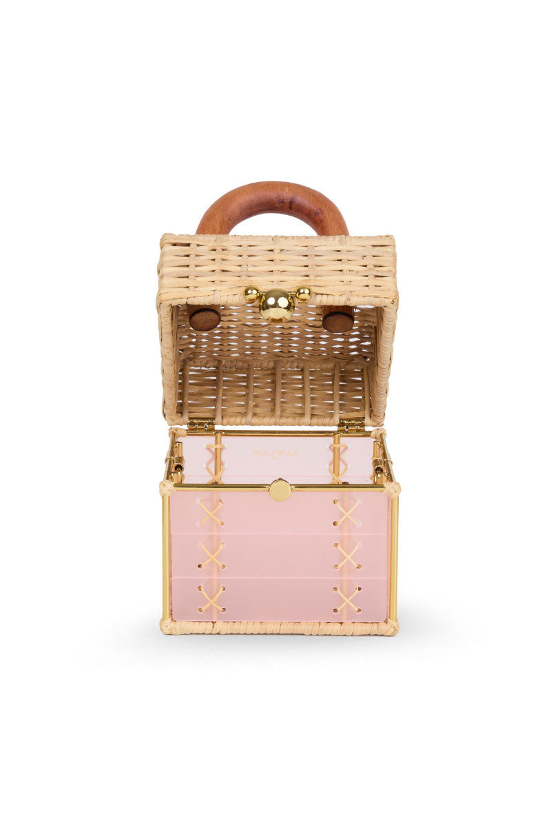 Waiwai Rio pink Cacau bag in top handle style with sleek design and rounded shape, featuring a short handle and smooth leather finish.