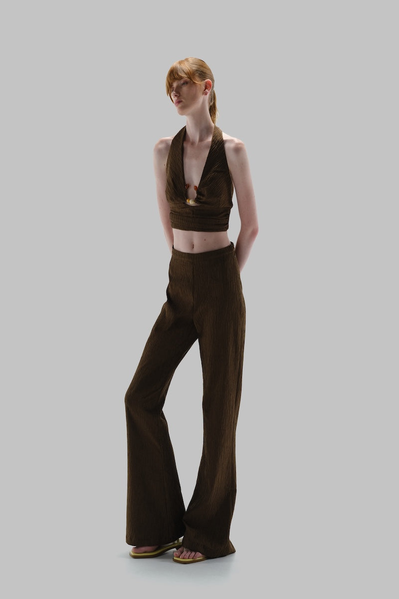 Baobab Louise Pants in espresso color, showing relaxed fit and stylish design with visible waistband and fabric texture.