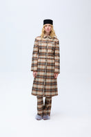 Brown checked plaid fitted trench coat by ColoReve, showing the tailored design and classic pattern on a model.