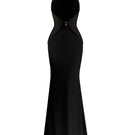 Black Xantheir Mermaid gown by Maison Des Copains with a floor-length design and elegant fitted silhouette, displayed on a dress form.