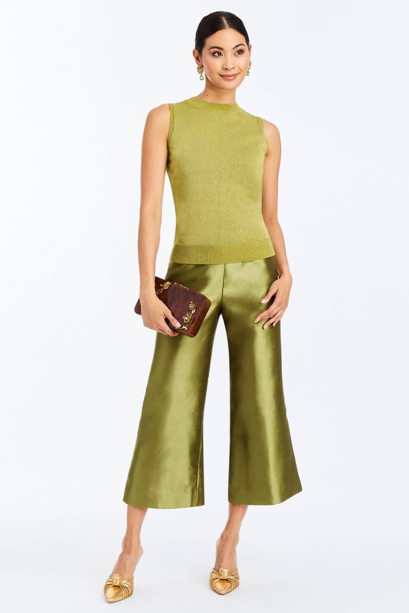 Mestiza New York SOHO metallic knit green top, close-up of the shiny textured fabric and fitted design.