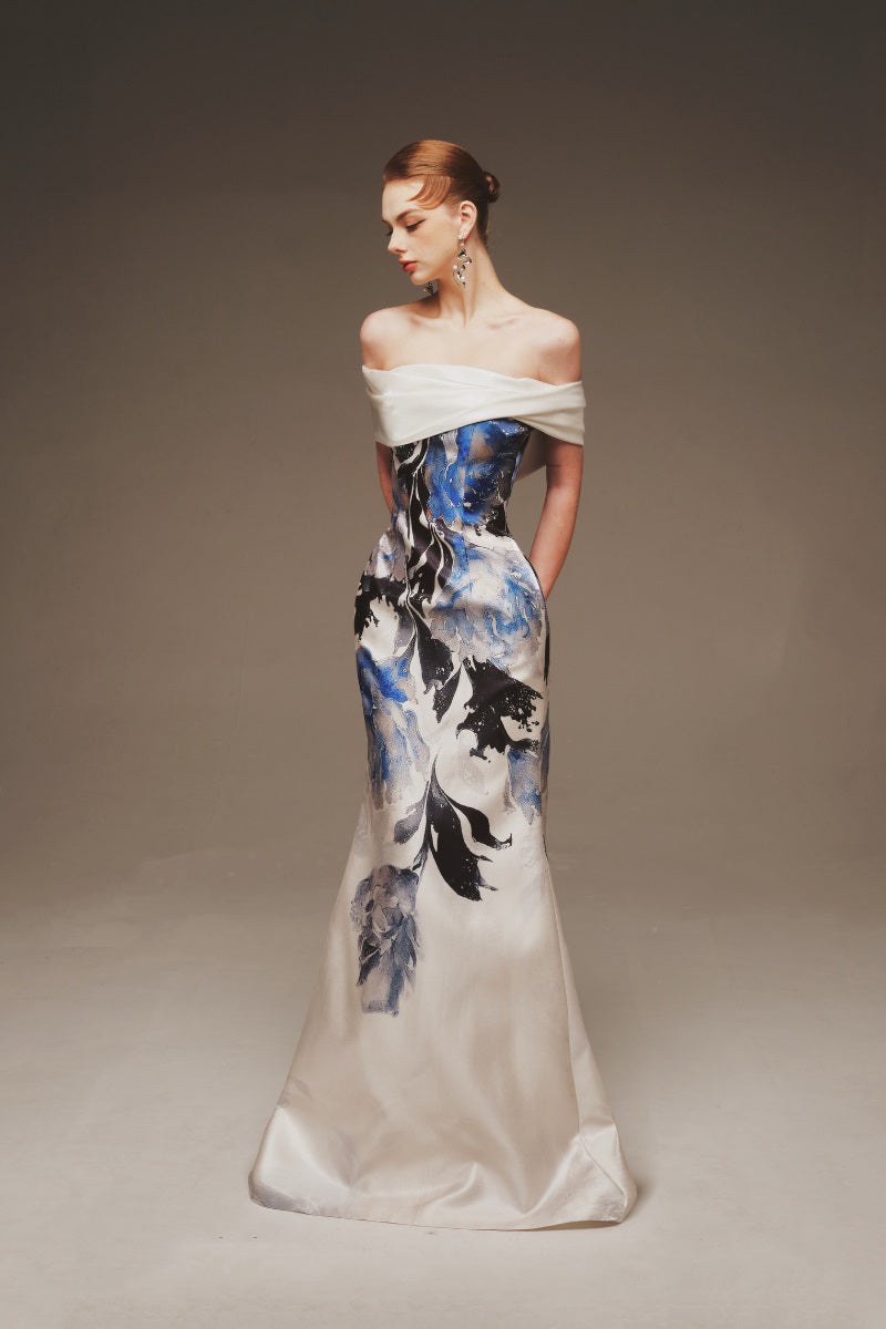 Cobalt blossom strapless maxi dress by Margée Atelier, flowing fabric with a fitted bodice and elegant floral design.