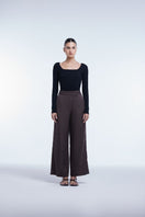 Relaxed wide-leg cropped pants by Dāl the Label, featuring soft fabric, high waist, and a casual, comfortable fit.