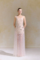 Elegant ASTE gown by Arti Apparel featuring a flowing design with intricate details, perfect for formal occasions.