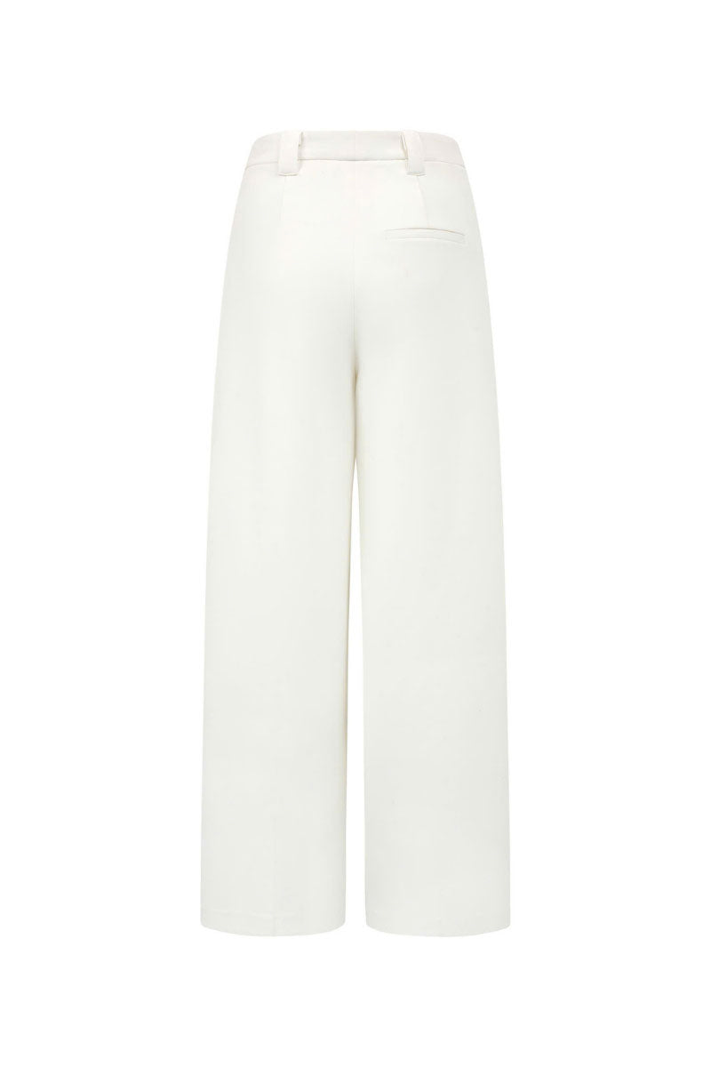 Arti Apparel Thorn Pants featuring a slim fit design, with visible stitching and a mid-rise waist in neutral fabric.