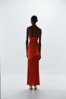 Baobab Gaia Maxi Dress in vibrant fiery color, flowing maxi dress with lightweight fabric and adjustable straps, perfect for summer wear.