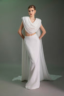Le Thanh Hoa Grecian Cloud set gown featuring flowing fabric and elegant draping, perfect for formal or special occasions.
