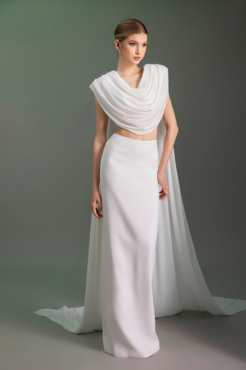 Le Thanh Hoa Grecian Cloud set of elegant gowns with flowing fabric and intricate detailing, suitable for formal occasions.