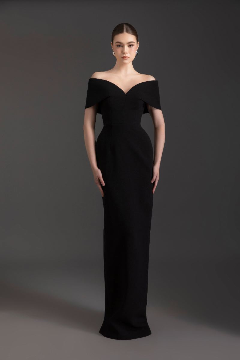 Le Thanh Hoa ELLE off-shoulder gown in elegant fabric, featuring a flowing design and off-shoulder neckline.
