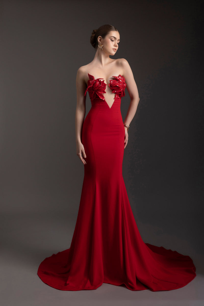 Le Thanh Hoa Scarlet Bloom Mermaid Gown featuring a fitted silhouette, intricate floral details, and elegant fabric for formal occasions.