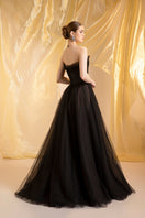 Elegant Nancy halter neck gown by Le Thanh Hoa featuring flowing fabric and a stylish design, perfect for formal occasions.