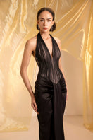 Elegant Le Thanh Hoa Venus Halter Gown featuring a flowing design with a halter neckline, perfect for formal occasions.