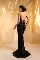 Le Thanh Hoa Venus Halter Gown featuring elegant draped fabric and a stylish halter neckline, perfect for formal occasions.