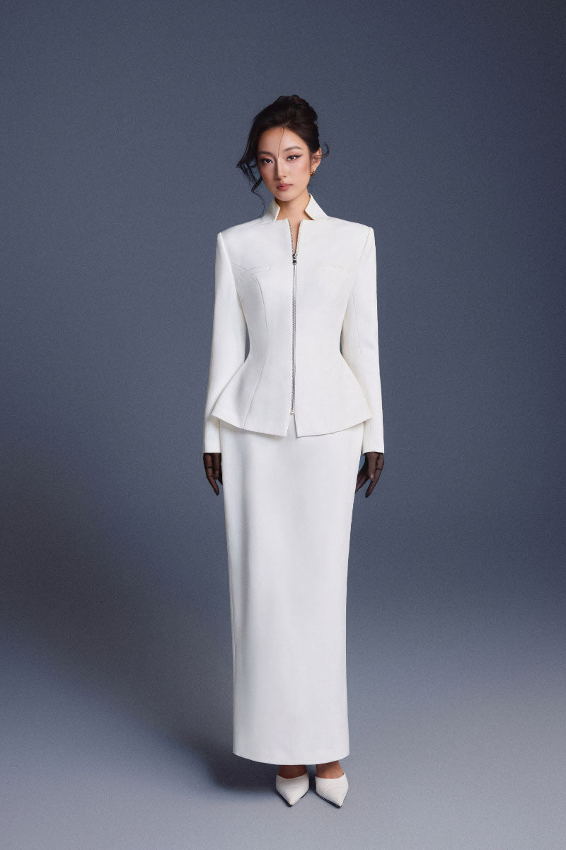 White zipper corset pencil skirt from Keira Tong, styled as a maxi skirt with a fitted silhouette and front zipper detail.