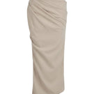 Beige tucked maxi skirt by Keira Tong displayed on a model, flowing fabric with a high waist and elegant length.