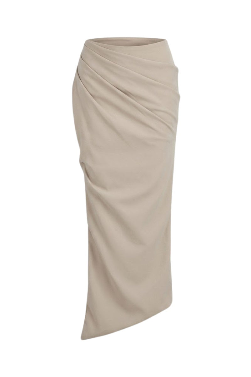Beige tucked maxi skirt by Keira Tong featuring a flowing design and elegant silhouette on a neutral background.