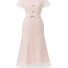 White Plan PRUCEL midi dress displayed on a hanger, showcasing its elegant, flowing fabric and stylish design.
