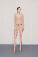Gold chain belt mini dress by CEM featuring a stylish mini dress with a gold chain belt, perfect for trendy fashion looks.