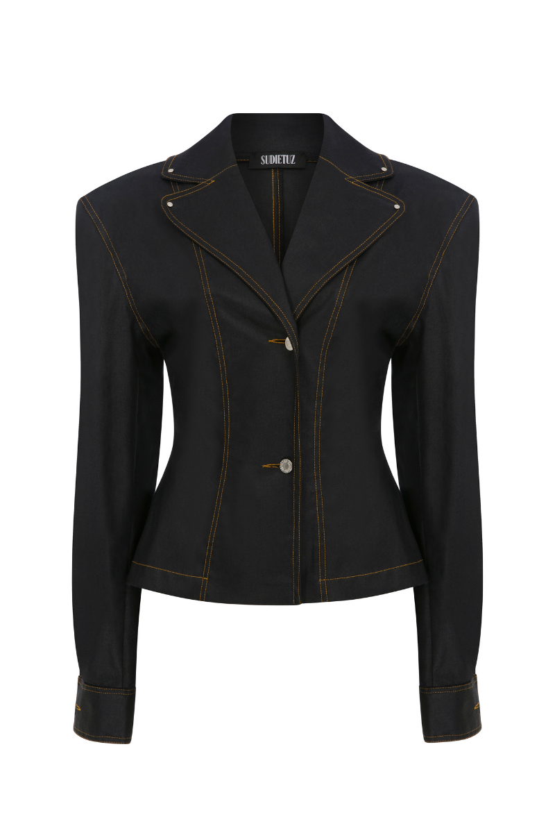 Sudi Etuz raw denim blazer with shoulder pads, featuring classic denim texture and tailored fit for a stylish casual look.