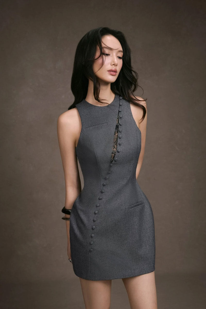 Keira Tong lace peek mini dress shown on a model, featuring intricate lace details and a fitted silhouette.