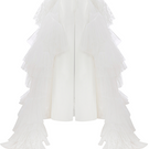 White crepe pants with ruffled train by Sudi Etuz, featuring wide-leg style and elegant, flowy fabric.