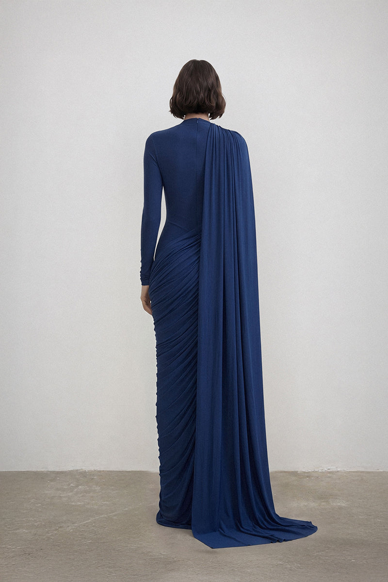 Deme by Gabriella Settle Dress gown with elegant design, featuring flowing fabric and a sophisticated silhouette.