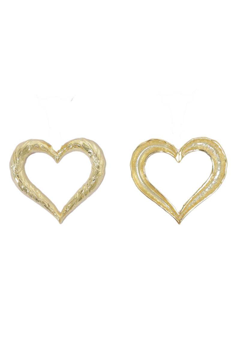 Heart-shaped earrings by Natia x Lako, featuring delicate design and polished finish, displayed on a white background.