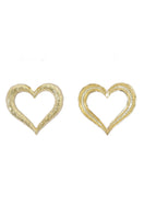 Heart-shaped earrings by Natia x Lako featuring shiny metal with a delicate heart design for stylish wear.