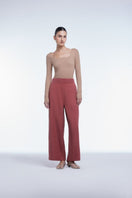 Relaxed wide-leg cropped pants by Dāl the Label, featuring a comfortable fit, soft fabric, and stylish design.