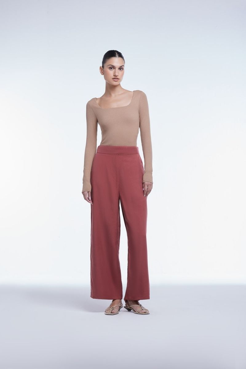 Relaxed wide-leg cropped pants by Dāl the Label, featuring a comfortable fit, soft fabric, and stylish design.