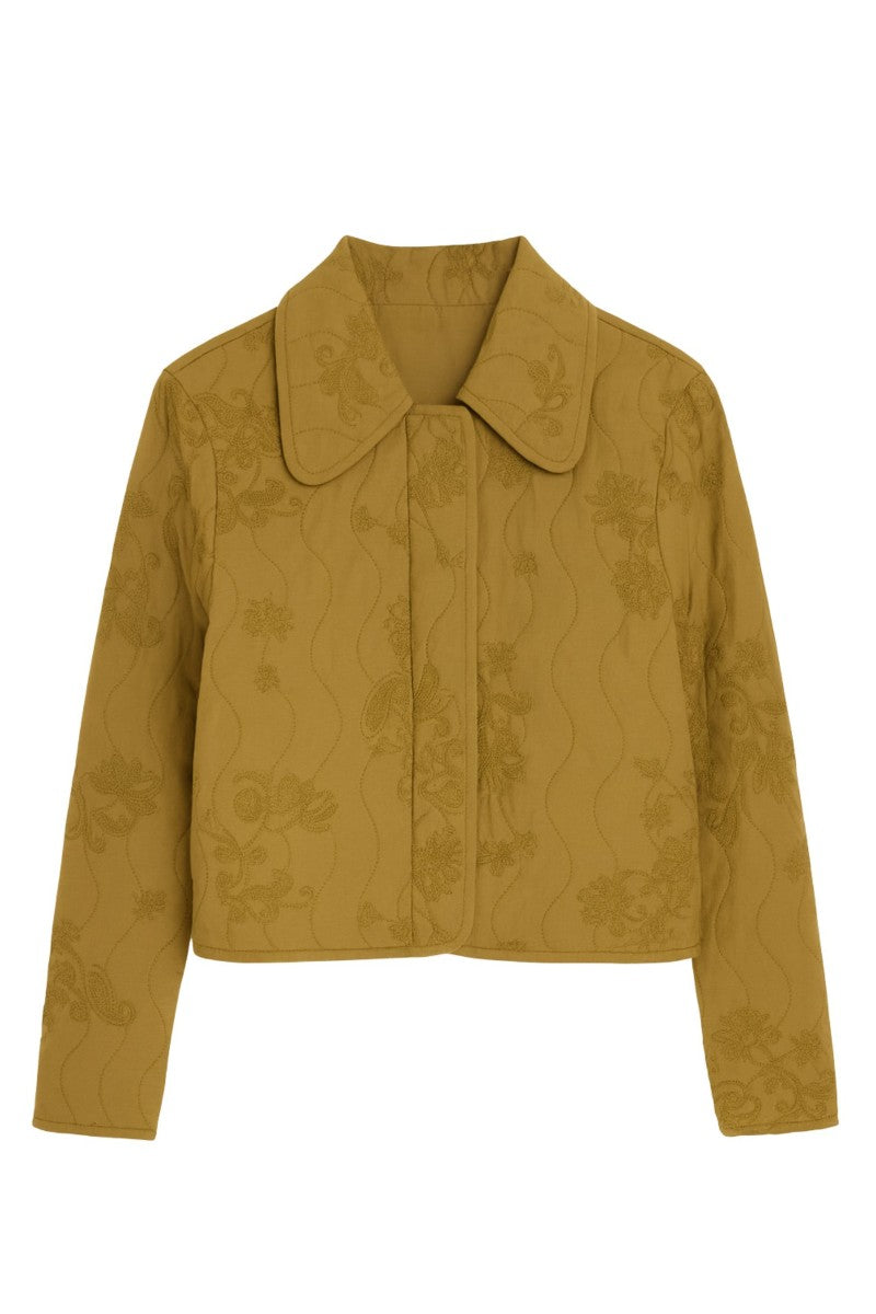 Rebecca Taylor Zuri quilted jacket in leaf green, showcasing the stylish, padded design with a fitted silhouette and textured fabric.