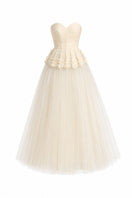 White Plan Anderson gown displayed on a hanger, featuring elegant fabric and a classic design suitable for formal occasions.