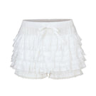Chictopia Lola Ivory Shorts displayed on a hanger, featuring a high-waisted fit and soft fabric for casual summer wear.