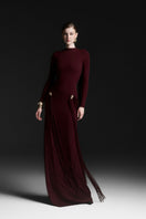 Red AVIELLE draped floor-length gown by Maison des Copains, elegant evening dress with flowing fabric and sophisticated style.