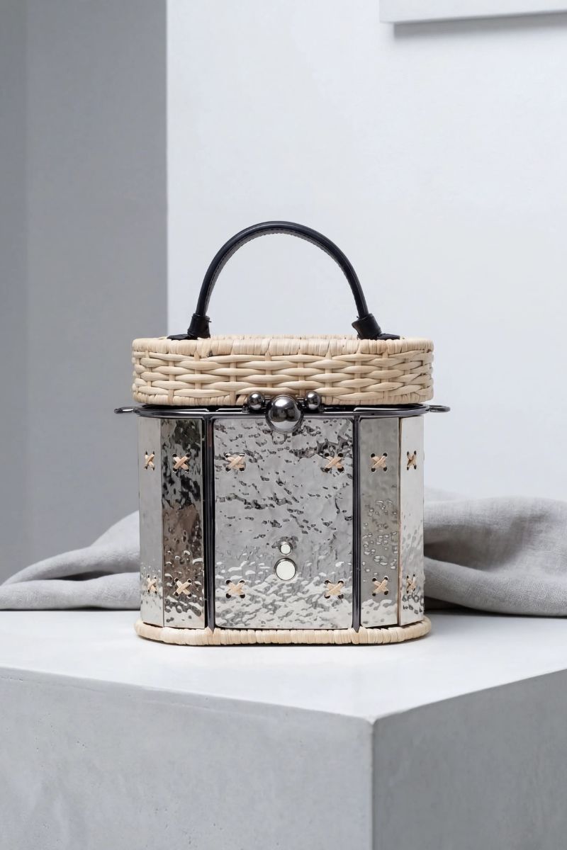 Waiwai Rio Copan bag in Aton, top handle bag with structured design and smooth leather finish, featuring a sleek silhouette.