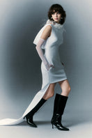 White Plan Ondine Mini Dress shown on a hanger, featuring a stylish, lightweight design perfect for casual or summer wear.