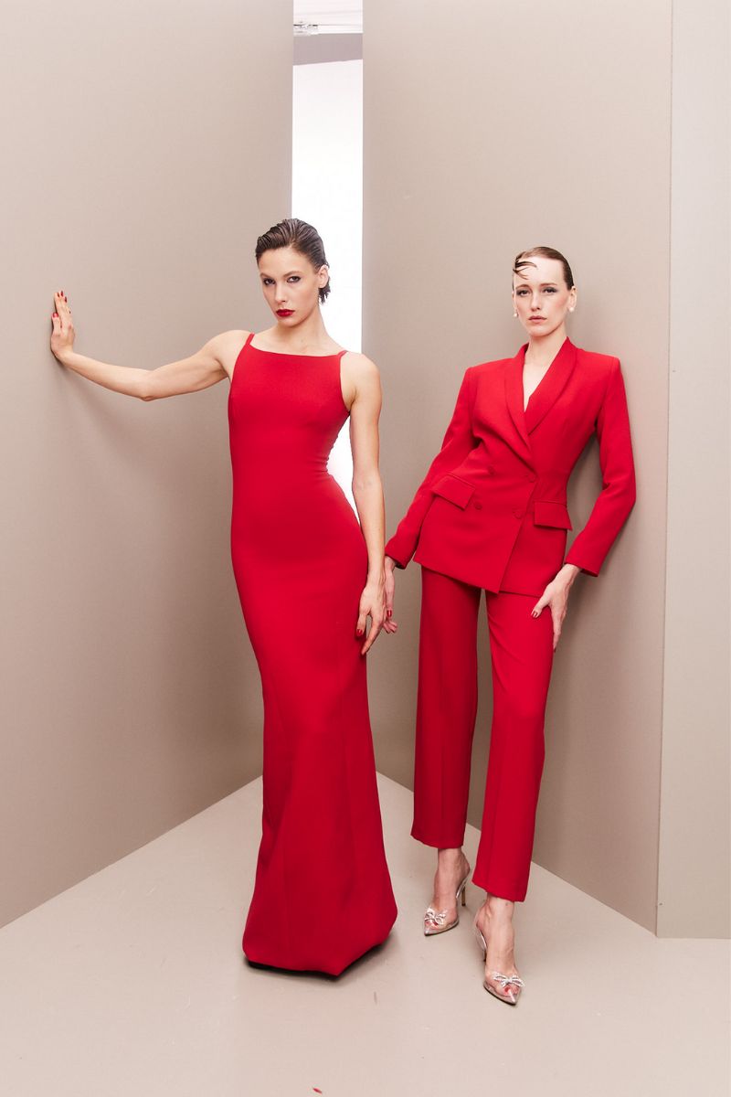 Joanna Andraos red hourglass co-ord suit set with fitted blazer and matching pants, stylish and tailored for a chic look.