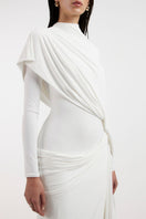 Deme By Gabriella Nadia white draped gown displayed on a mannequin, featuring elegant fabric and flowing design.