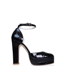 Black Terry de Havilland Lily platform block heels with chunky heel and open toe design, showcased from a side angle.
