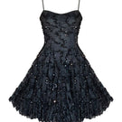 Gigii's Karolin Dress mini dress in vibrant fabric, featuring a stylish fitted silhouette and elegant design.