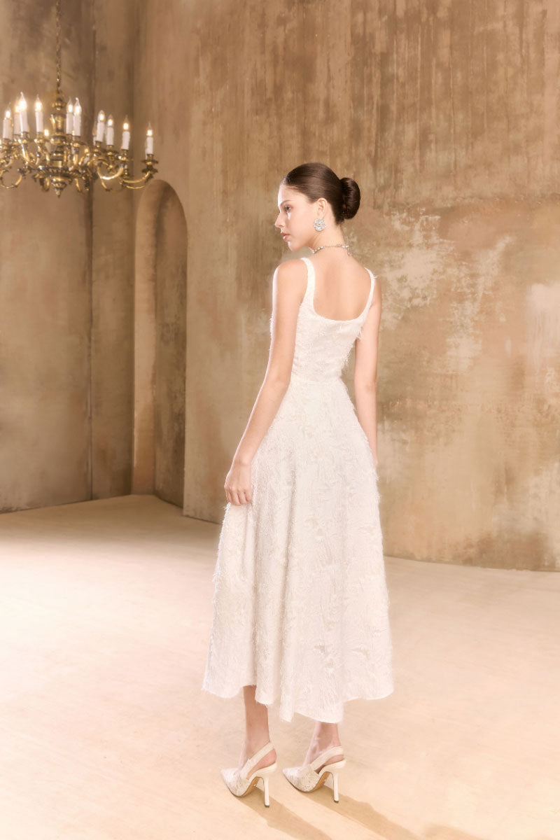 Arti Apparel Montsand midi dress in floral print, sleeveless design with a fitted waist, perfect for summer or casual occasions.