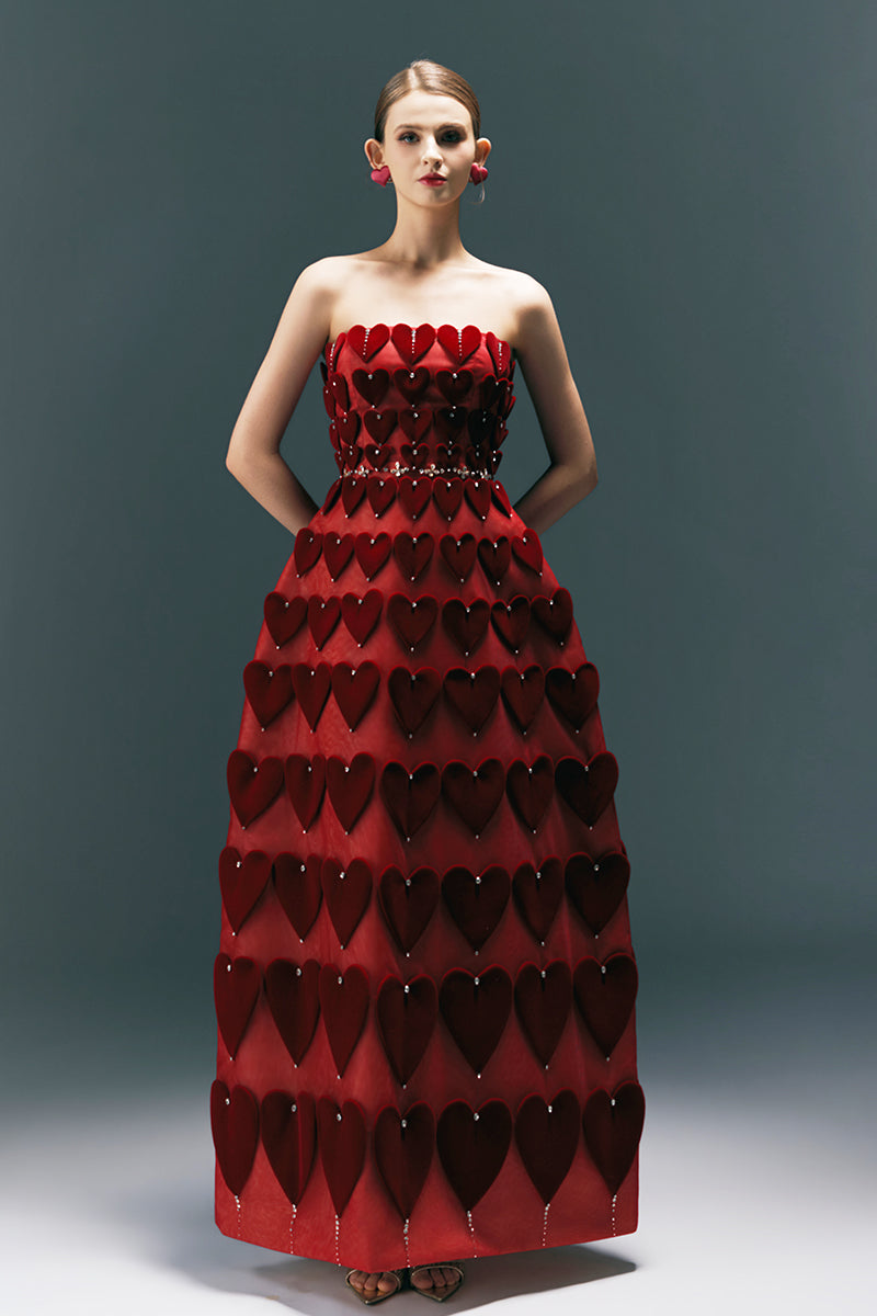 HAPPY CLOTHING CULT MIA X burgundy gown with embellished heart motif, flowing fabric, elegant evening dress for special occasions.