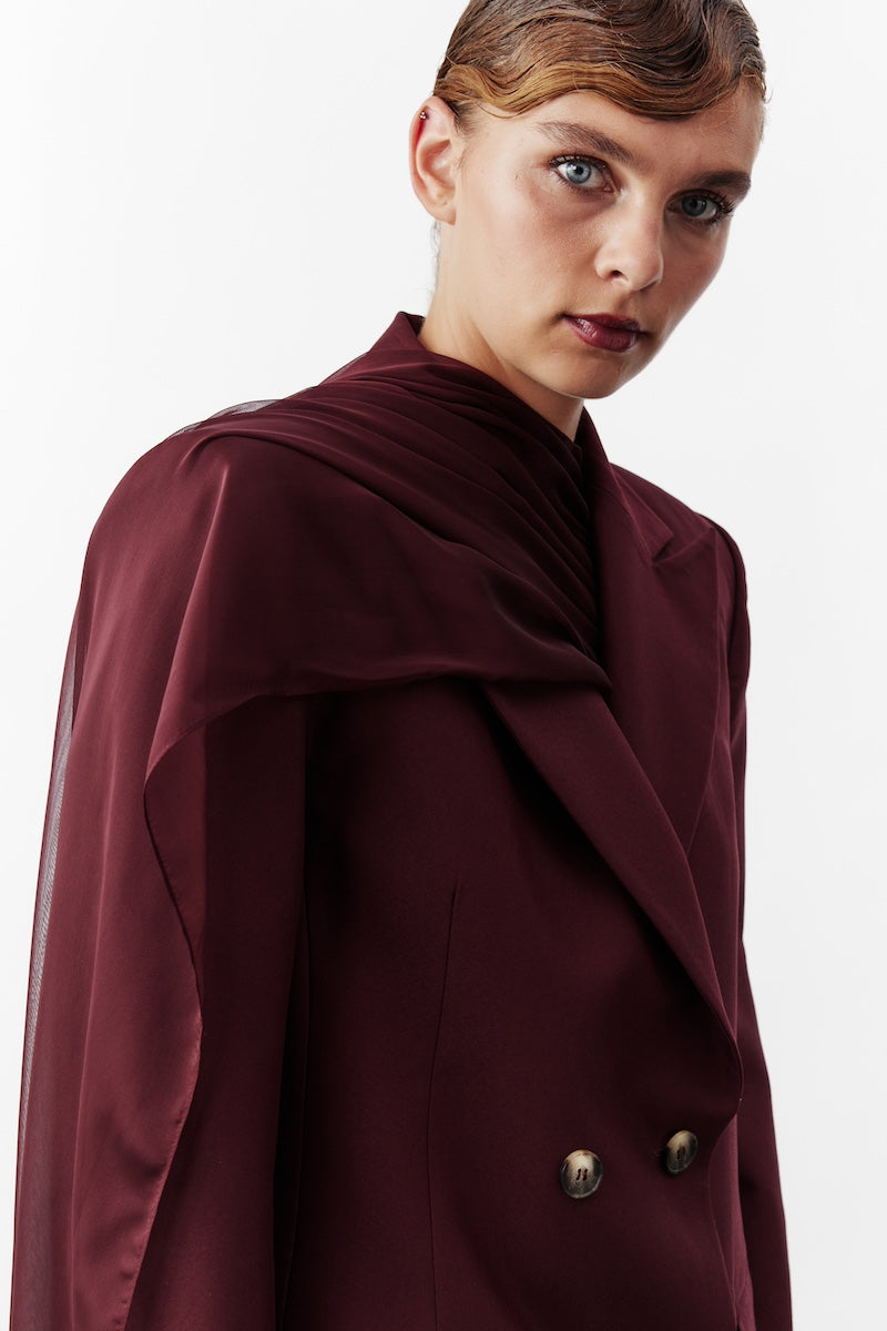 Nazlı Ceren ELODIE Bordeaux jacket displayed on a hanger with detailed fabric and tailored fit, showcasing stylish outerwear.
